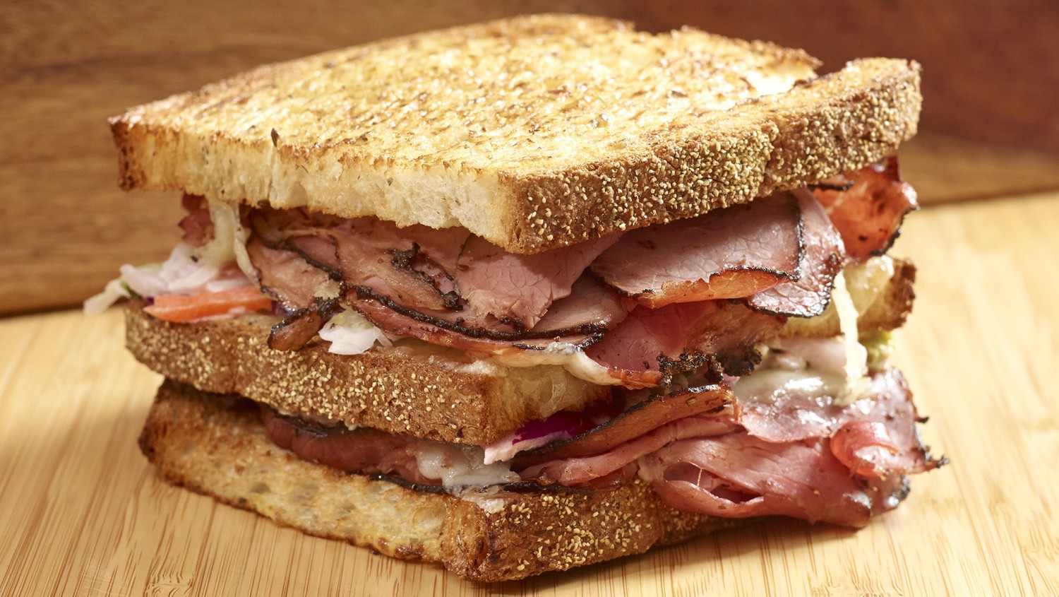 Amway Grand_The Kitchen Counter by Wolfgang Puck_Sandwich_Pastrami_Cheese_Sourdough Bread
