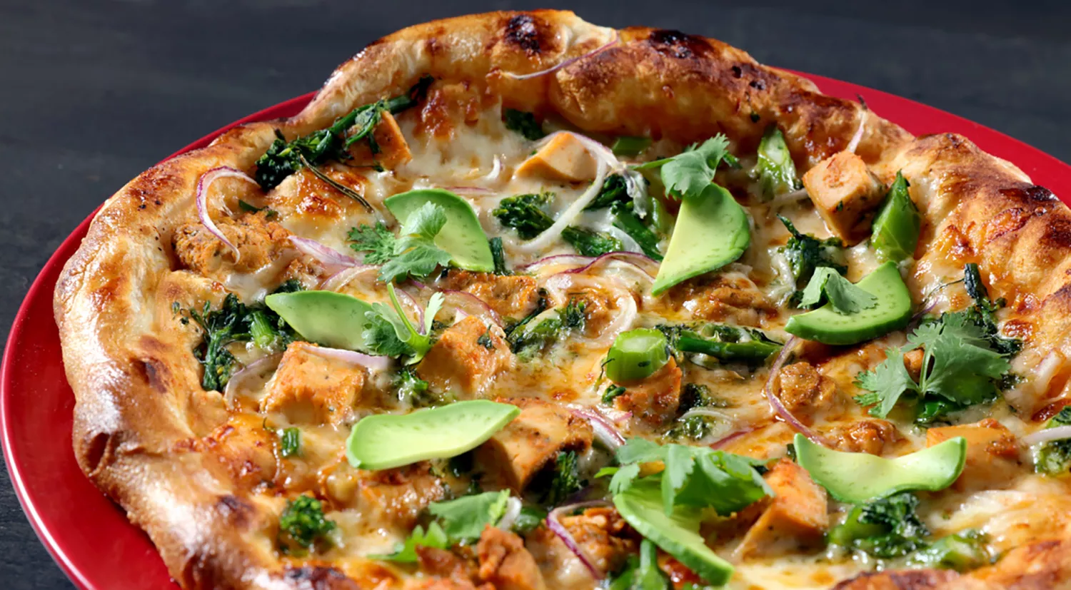 Amway Grand_The Kitchen by Wolfgang Puck_Pizza_Onions_Greens_Meat