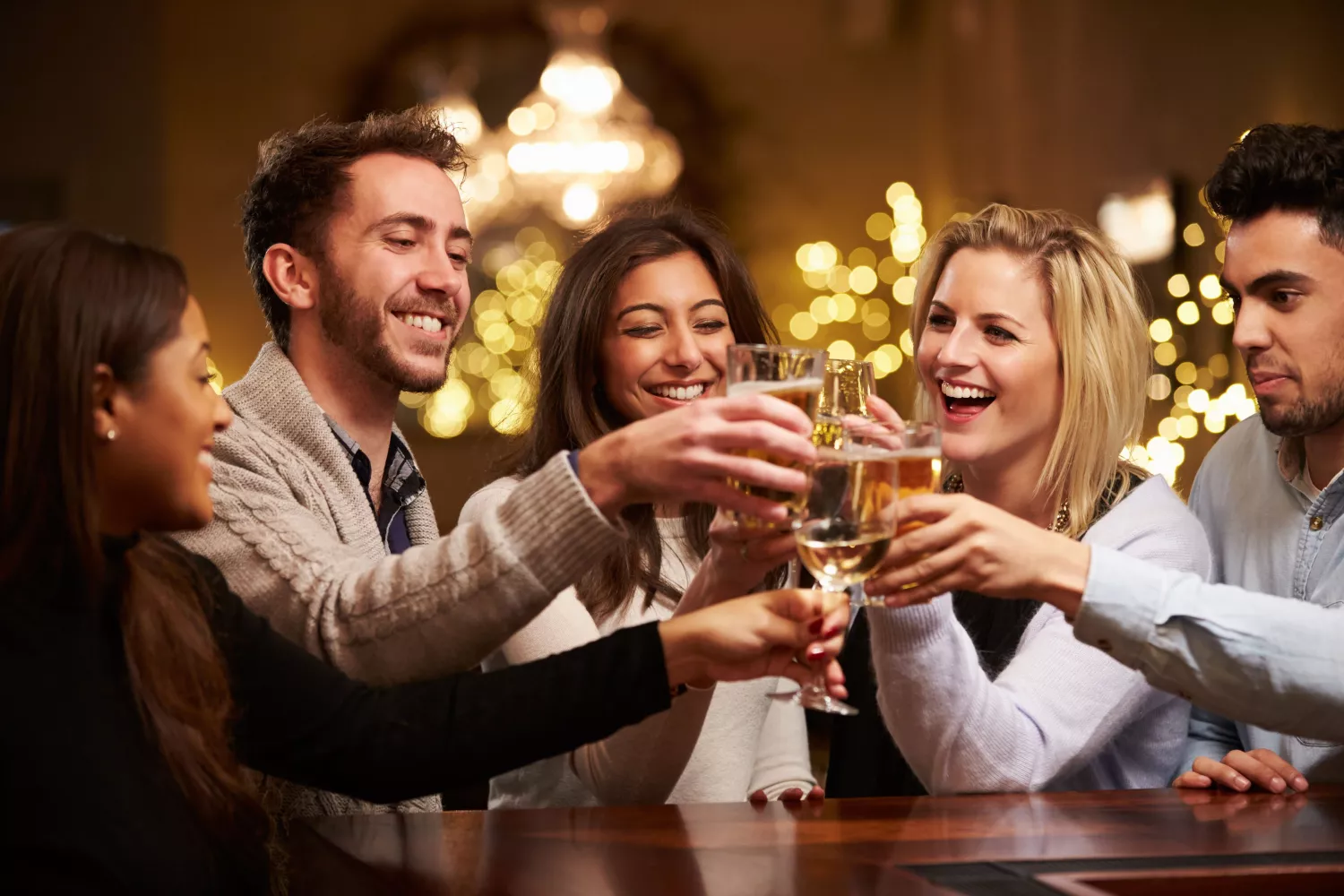 Amway Grand_Ruth's Chris Steak House_Group of Friends at Bar_Wine Glasses_Cheers