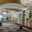 Amway Grand_East Concourse_Empty_Gold Ceiling_Tables_Seating Areas_2nd Floor_Chandeliers_Pantlind Lobby_Plants_Paintings_Hallway