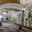 Amway Grand_East Concourse_Empty_Gold Ceiling_Tables_Seating Areas_2nd Floor_Chandeliers_Pantlind Lobby_Plants_Paintings_Hallway