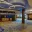 Amway Grand_West Concourse Registration_Event Space_Check In Area_One Pillar_Chairs_Tables_Two Seating Areas_Mirrors_Window_Plants