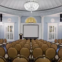 Amway Grand_Ford Ballroom_Ballroom_Meeting Room_Event Space_Set Up_Rows of Chairs_Projector Screen_Podium_Chandeliers_Mirrors