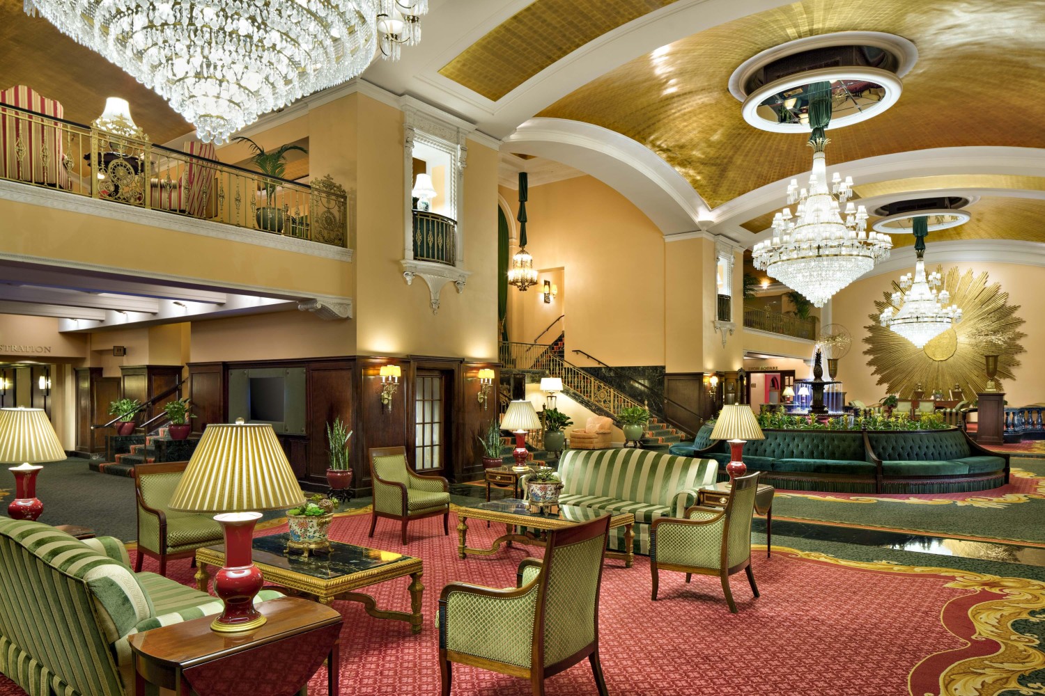 Amway Grand_Pantlind Lobby_Couches_Chairs_Tables_Lamps_Chandeliers_Stairs_Fountain_Gold Sunburst_Gold Ceiling