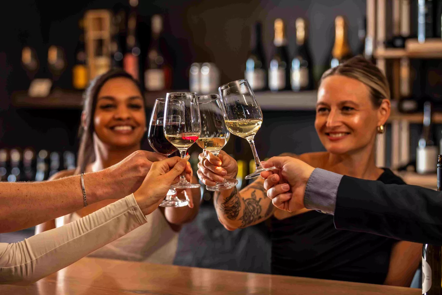 Amway Grand_Four People with wine Glasses Cheersing