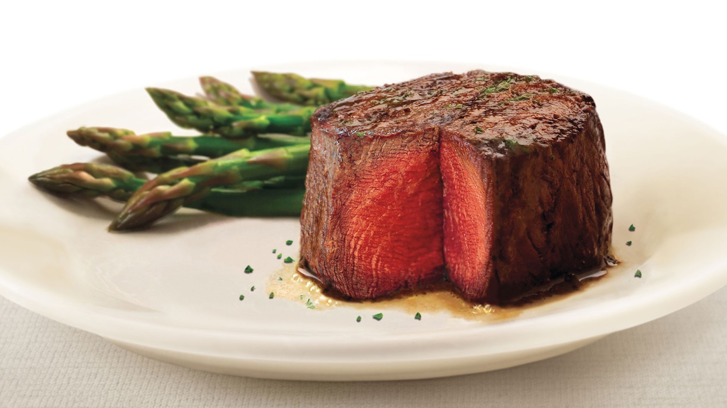 Amway Grand_Ruths Chris Steak House_Steak with Wedge Cut Out_Asparagus