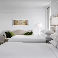 Amway Grand_Superior_Two Queen Beds_Dresser_TV_Couch_Lamps