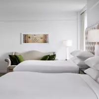 Amway Grand_Superior_Two Queen Beds_Dresser_TV_Couch_Lamps