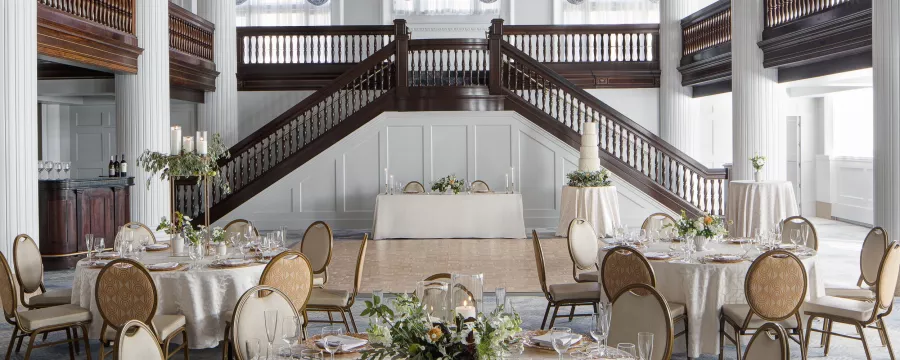 Amway Grand_Imperial Ballroom_Wedding_Event_Tables_Chairs_linen_Plates_Silverware_Napkins_Glasses_Dance Floor_Chadnelier_Windows_Stairs_Balcony_Mezzanine_Flowers
