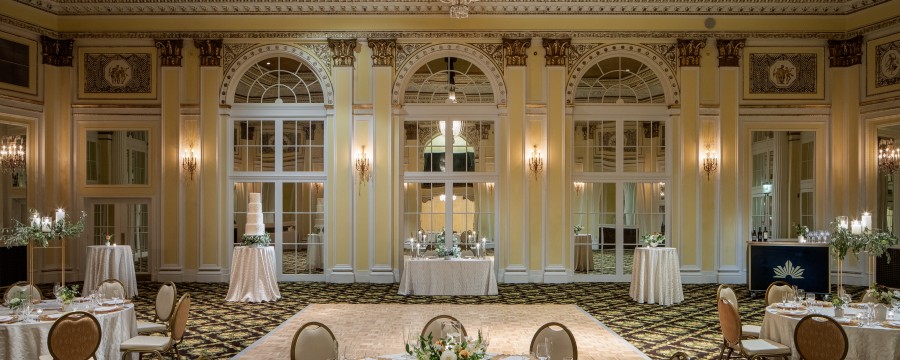 Amway Grand_Pantlind Ballroom_Wedding_Event_Tables_Chairs_linen_Plates_Silverware_Napkins_Glasses_Dance Floor_Chadnelier_Mirrors_Flowers