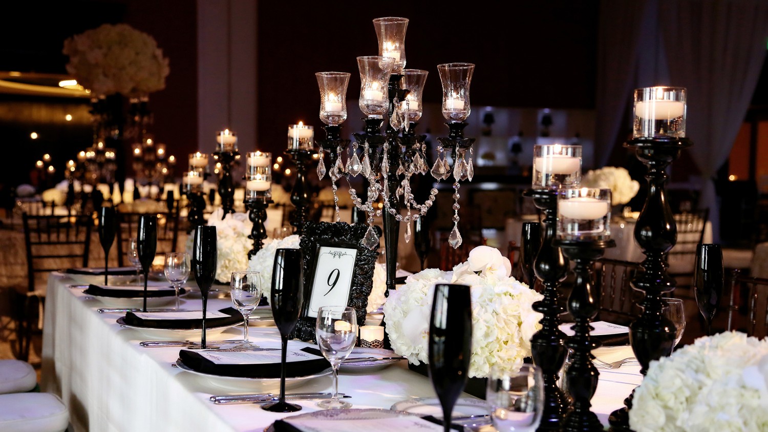 Amway Grand_Wedding Set Up_Champagne Glasses_Candlesticks_Flowers_Plates_Napkins_Glasses