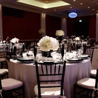 Amway Grand_Ambassador Ballroom_Wedding Set Up_Chandelier_Linen_Tables_Chairs_Flowers_Candles