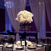 Amway Grand_Wedding Set Up_Detail Shot_Flower on Tall Stand_Dim Lights_Drapery