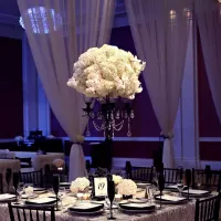 Amway Grand_Wedding Set Up_Detail Shot_Flower on Tall Stand_Dim Lights_Drapery